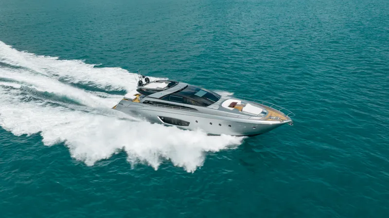 Purosangue Yacht Photos Pics Luxurious 2014 Riva 86' DOMINO yacht cruising on open blue waters.