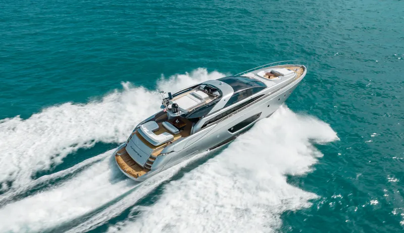 Purosangue Yacht Photos Pics Luxurious 2014 Riva 86' DOMINO yacht cruising on open sea.