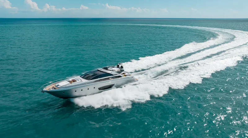 Purosangue Yacht Photos Pics Luxurious 2014 Riva 86' DOMINO yacht cruising on open sea.