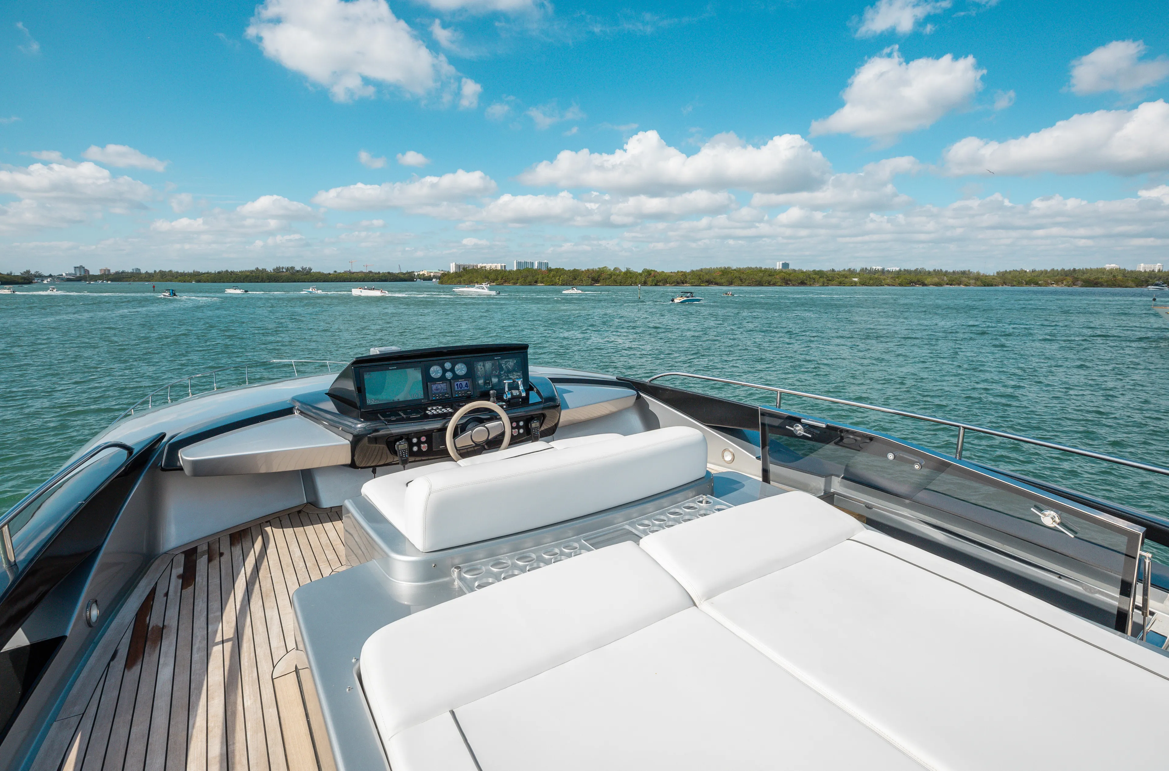 Purosangue Yacht Photos Pics Luxurious 2014 Riva 86' DOMINO yacht with sleek deck and scenic ocean view.