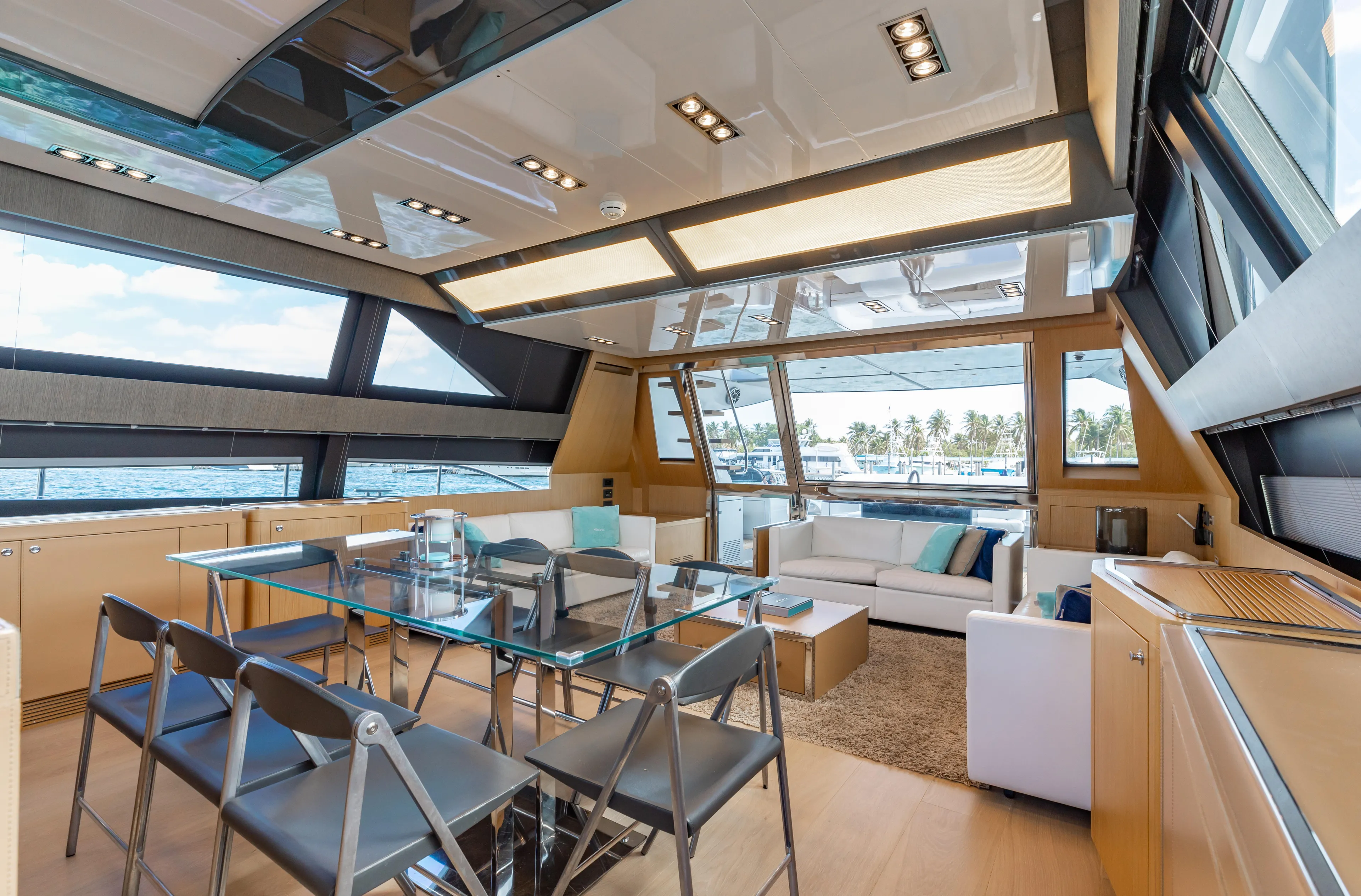 Purosangue Yacht Photos Pics Luxurious interior of 2014 Riva 86' DOMINO yacht with modern furnishings and ocean view.