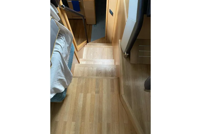  Yacht Photos Pics Wooden interior stairs on a 2009 Princess V62 yacht.