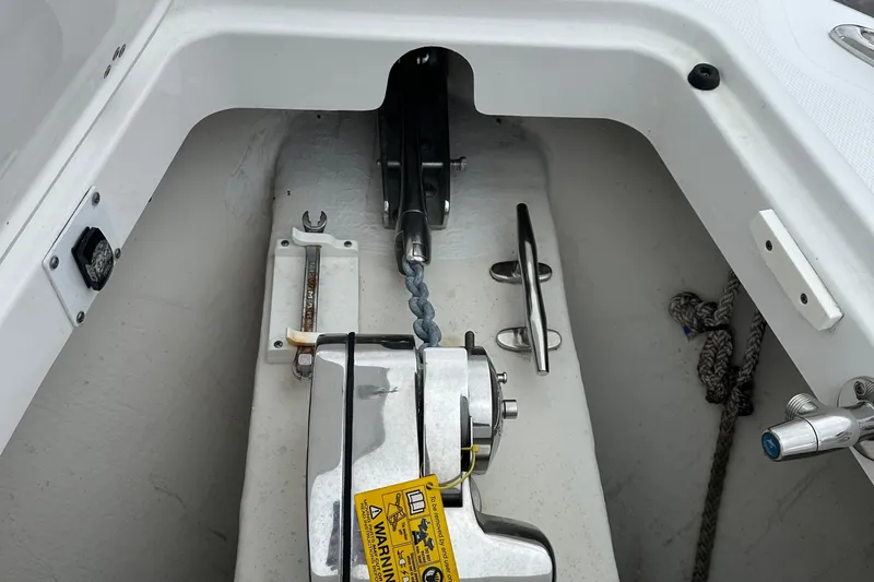 Bali Hai Yacht Photos Pics Anchor system of a 2020 Edgewater 370CC boat, featuring a winch and chain.
