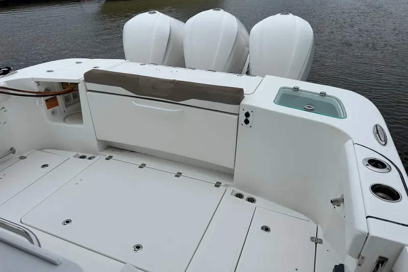 Bali Hai Yacht Photos Pics 2020 Edgewater 370CC boat deck with storage and triple outboard engines.