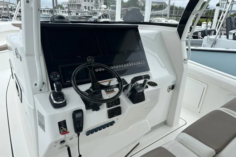 Bali Hai Yacht Photos Pics 2020 Edgewater 370CC boat helm with modern controls and navigation screens.