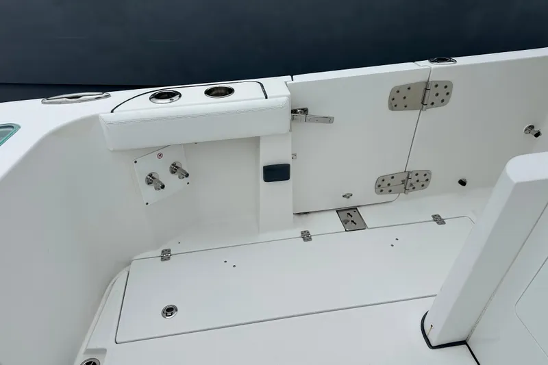 Bali Hai Yacht Photos Pics 2020 Edgewater 370CC boat interior with white seating and stainless steel fixtures.