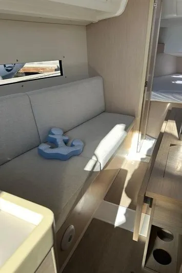 Sea Saw Yacht Photos Pics Interior of 2023 Beneteau Oceanis 30.1 yacht with cozy seating and modern design.