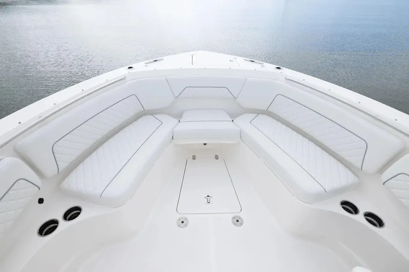  Yacht Photos Pics Manufacturer Provided Image: Luxurious seating area on 2025 Pursuit S 328 Sport boat, overlooking calm waters.
