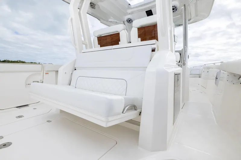  Yacht Photos Pics Manufacturer Provided Image: 2025 Pursuit S 328 Sport boat interior with white seating and sleek design.