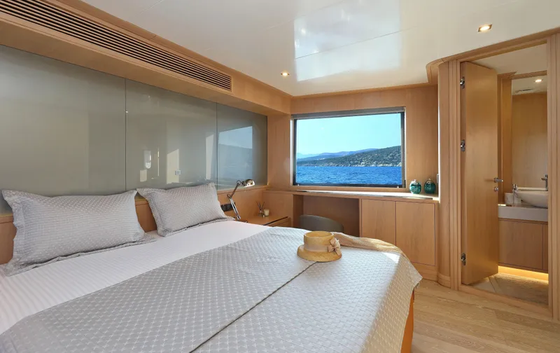 Tortura Yacht Photos Pics Luxurious cabin interior of 2024 Aegean Yacht Explorer M26 with ocean view.