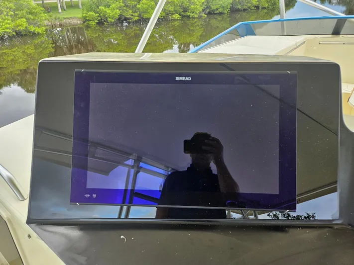  Yacht Photos Pics Simrad display on 1991 Donzi 65 Sportfisherman boat.