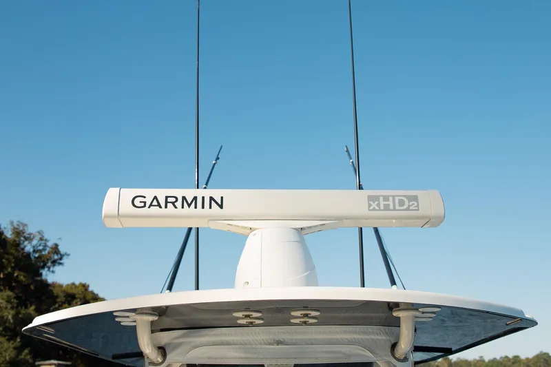  Yacht Photos Pics 2014 Yellowfin 34 Offshore boat with Garmin xHD2 radar against clear sky.