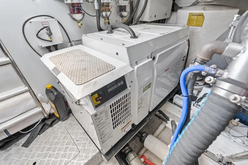 One Life Yacht Photos Pics Engine room of 2016 Princess 60 Flybridge Motor Yacht with Cummins Onan generator.