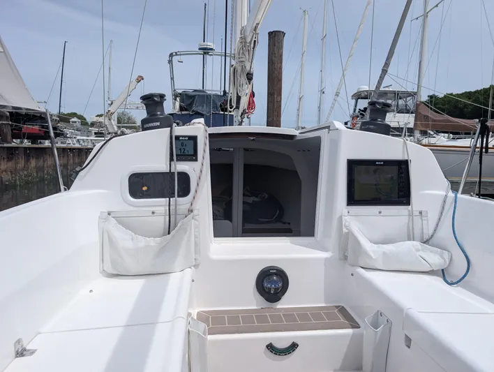  Yacht Photos Pics 2023 J Boats J/9 sailboat cockpit with modern navigation equipment and spacious seating.