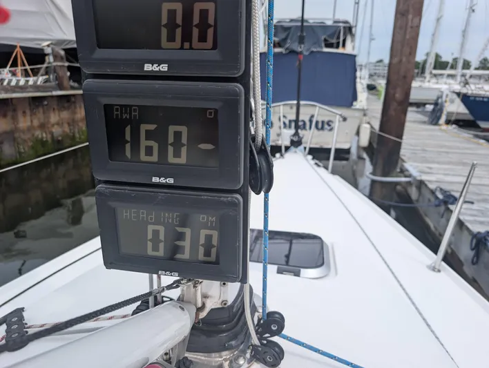  Yacht Photos Pics 2023 J Boats J/9 sailboat with B&G instruments displaying wind and heading data at a marina.