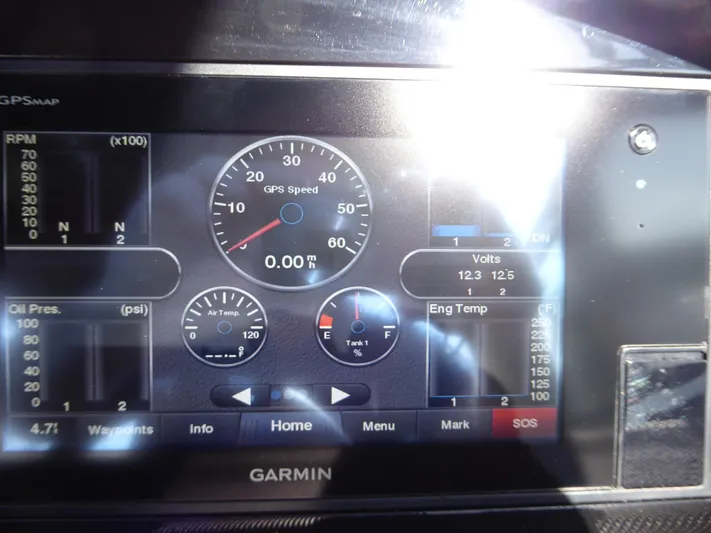  Yacht Photos Pics Garmin display showing GPS speed, RPM, oil pressure, and engine temperature on a 2017 Cobalt R30.