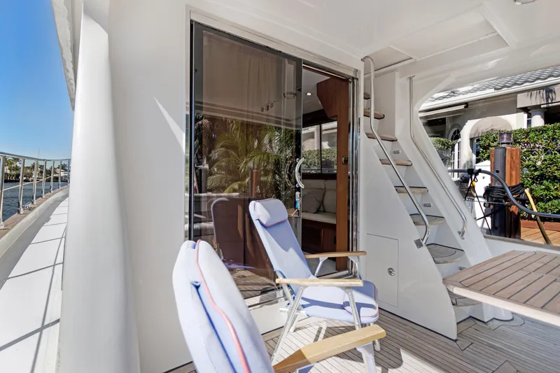  Yacht Photos Pics Luxury 2006 Noresman 480 Sedan yacht deck with seating and scenic view.