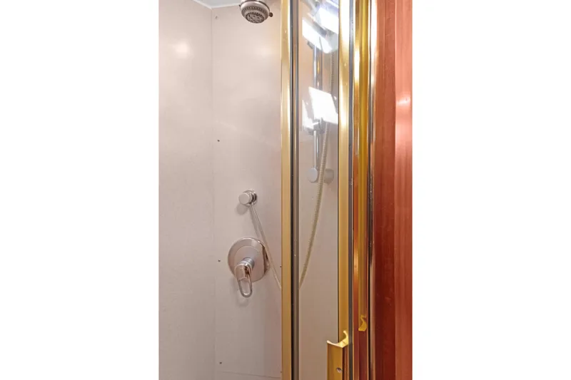  Yacht Photos Pics Shower area in 2006 Noresman 480 Sedan with glass door and chrome fixtures.