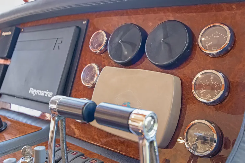  Yacht Photos Pics Dashboard of 2006 Noresman 480 Sedan with gauges and Raymarine equipment.