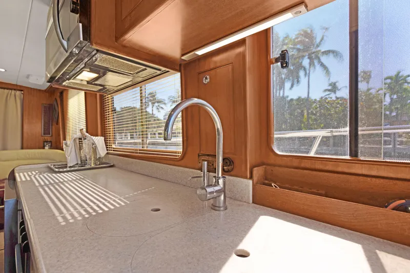  Yacht Photos Pics Interior of 2006 Noresman 480 Sedan yacht kitchen with sink and window view.