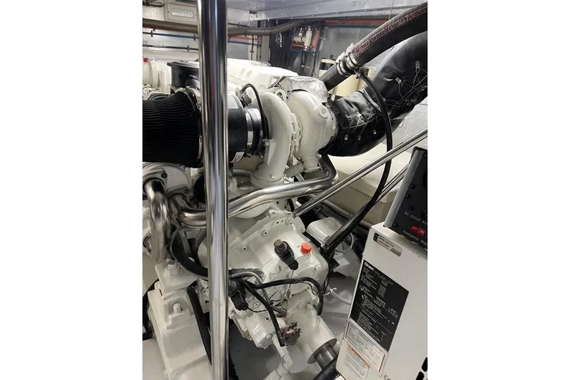  Yacht Photos Pics Engine room of a 2006 Norseman 480S yacht, showcasing mechanical components.