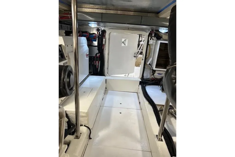  Yacht Photos Pics Engine room of 2006 Norseman 480S boat, featuring clean layout and equipment.