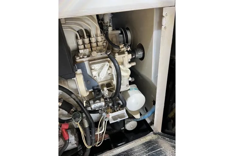  Yacht Photos Pics Engine compartment of a 2006 Norseman 480S, showcasing mechanical components and wiring.