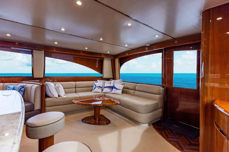 Harbor Time Yacht Photos Pics Luxurious interior of 2013 Viking 66 Open yacht with ocean view and elegant seating area.