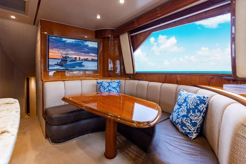 Harbor Time Yacht Photos Pics Luxurious interior of 2013 Viking 66 Open yacht with elegant seating and ocean view.