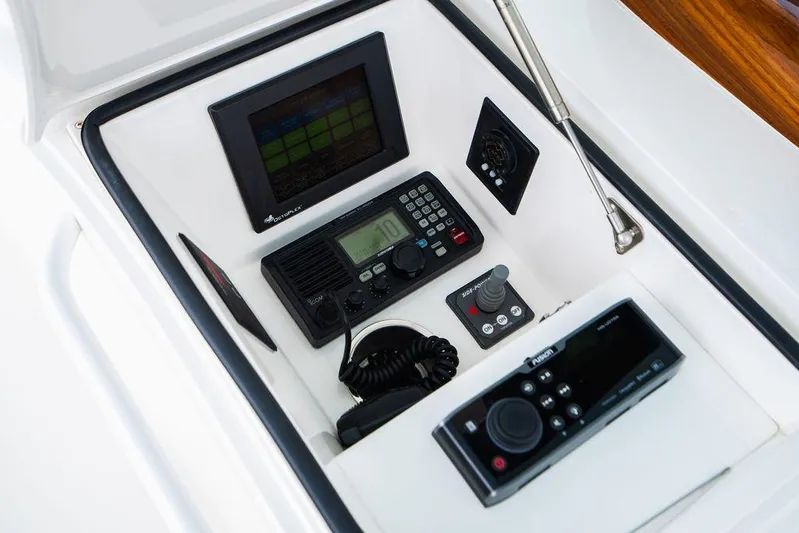 Harbor Time Yacht Photos Pics Control panel of 2013 Viking 66 Open yacht with navigation and communication equipment.