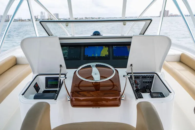 Harbor Time Yacht Photos Pics 2013 Viking 66 Open yacht helm with navigation screens and controls.