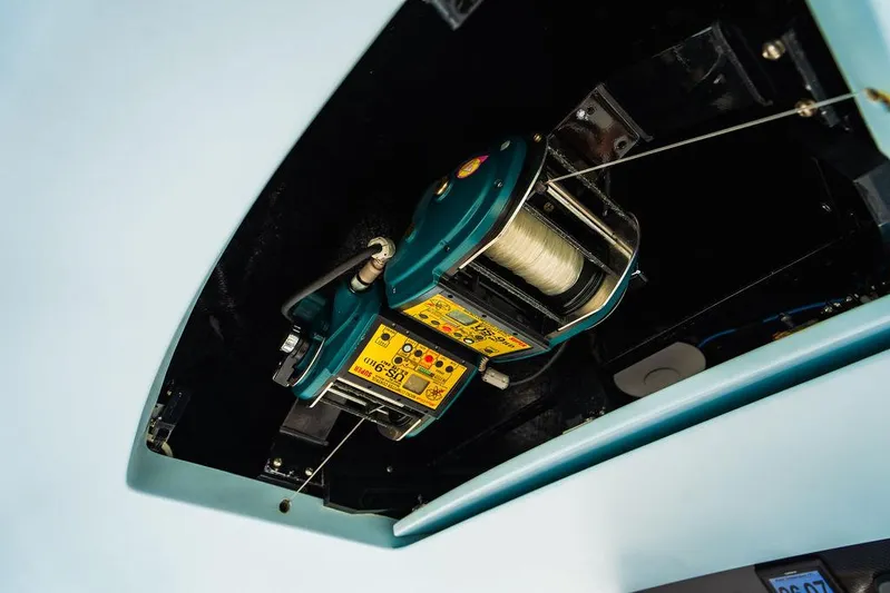 Harbor Time Yacht Photos Pics 2013 Viking 66 Open fishing reel mechanism, close-up view.