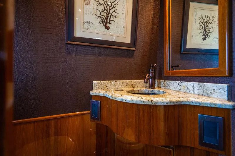 Harbor Time Yacht Photos Pics Luxurious bathroom in 2013 Viking 66 Open yacht with elegant wood and granite finishes.
