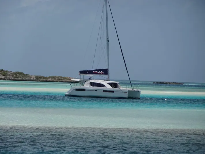 Second Treasure II Yacht Photos Pics 2020 Leopard 40 catamaran sailing in turquoise waters.