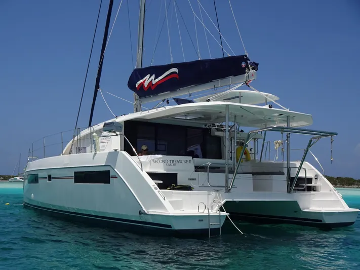 Second Treasure II Yacht Photos Pics 2020 Leopard 40 catamaran sailing on clear blue waters.