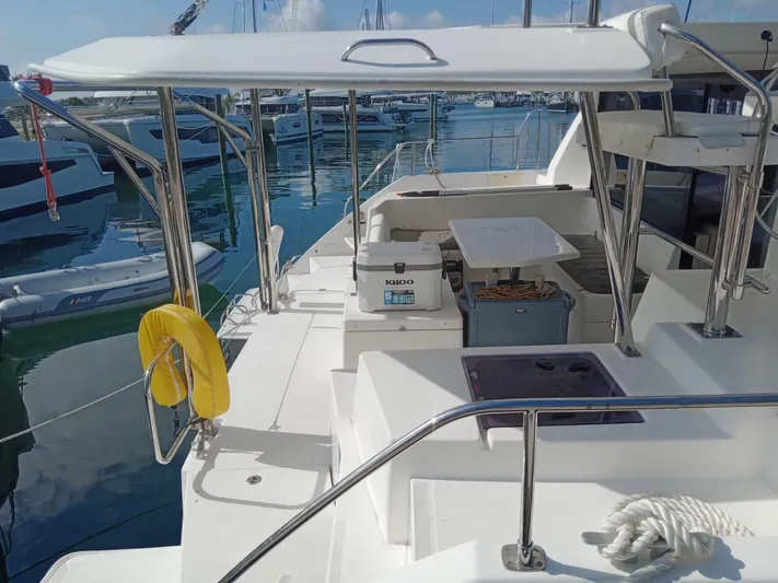 Second Treasure II Yacht Photos Pics 2020 Leopard 40 catamaran docked at marina, featuring spacious deck and seating area.