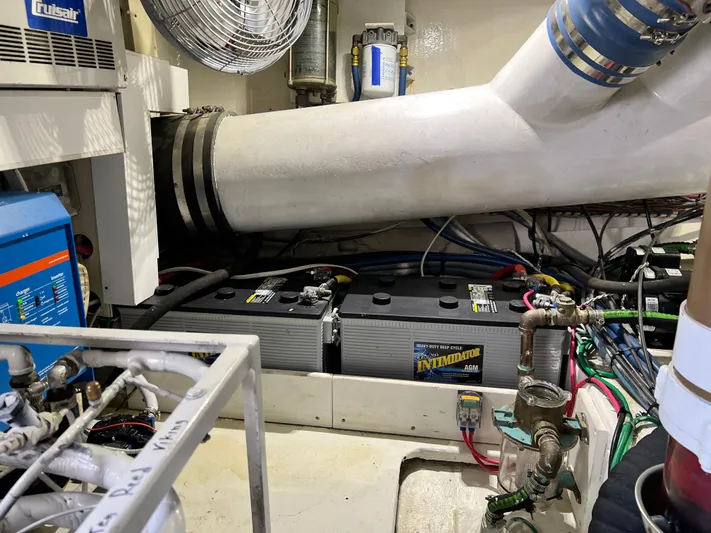 Double Nickel Yacht Photos Pics Engine room of 1999 Viking 55 yacht with batteries and ventilation system.