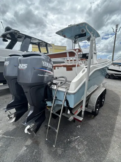 Cobia 254 Yacht Photos Pics 2001 Cobia 254 Center Console boat with twin Yamaha 225 engines on a trailer.