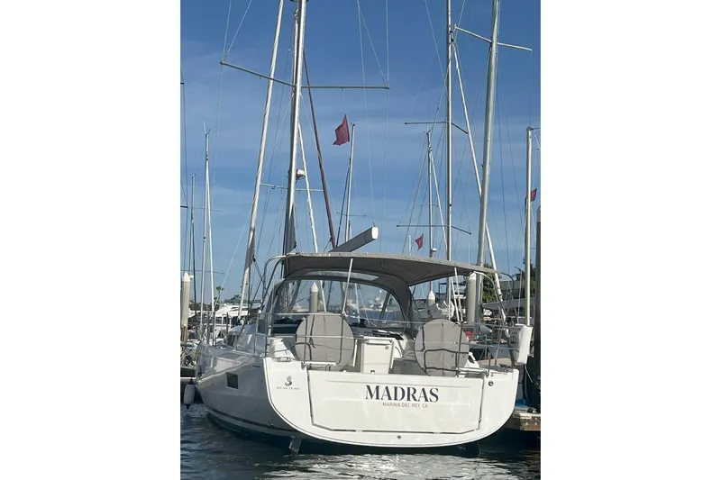 Madras Yacht Photos Pics 2022 Beneteau Oceanis 40.1 sailboat docked at marina, rear view.