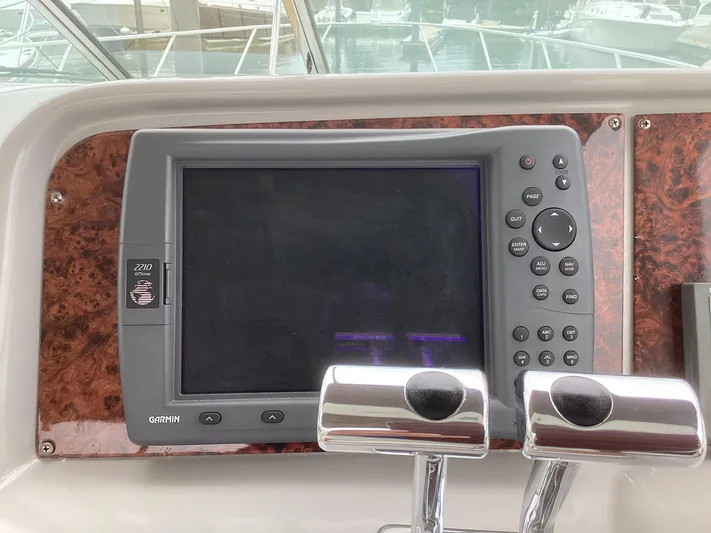 Four-some Fun Yacht Photos Pics Garmin navigation system on a 2001 Formula 40 PC boat dashboard.