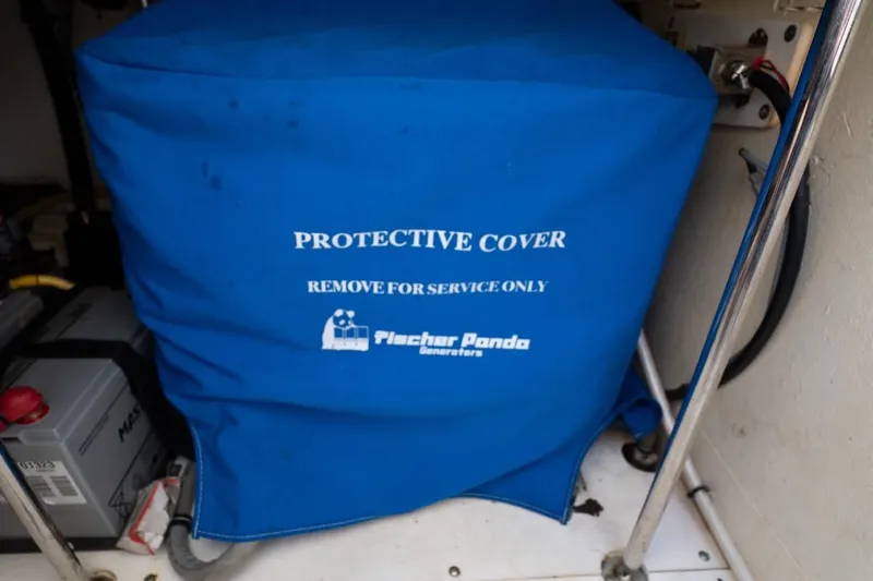  Yacht Photos Pics Blue protective cover on Fischer Panda generator in 2014 Pursuit SC 365i Sport Coupe.