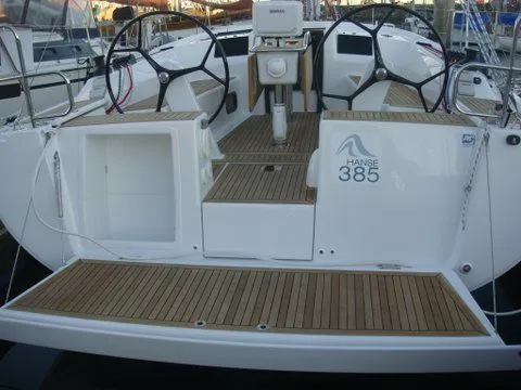 Bonejour Yacht Photos Pics Hanse 385 sailboat cockpit, 2012 model, featuring dual steering wheels and teak decking.