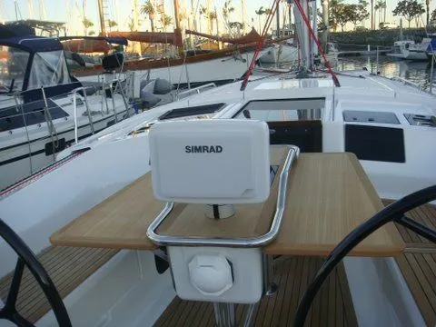 Bonejour Yacht Photos Pics Hanse 385 sailboat cockpit with Simrad navigation system, 2012 model, docked at marina.