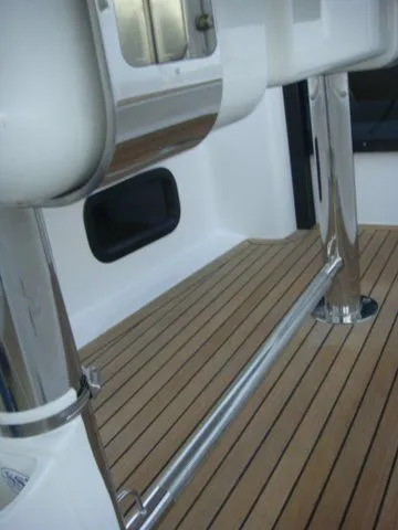 Bonejour Yacht Photos Pics Hanse 385 yacht deck, 2012 model, featuring sleek chrome and wood finish.