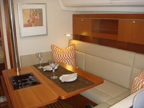 Bonejour Yacht Photos Pics Interior of 2012 Hanse 385 yacht with elegant dining area and modern decor.