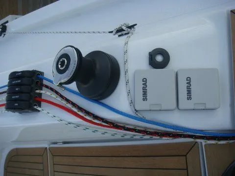 Bonejour Yacht Photos Pics Hanse 385 sailboat deck with winch, Simrad equipment, and colorful ropes, 2012 model.