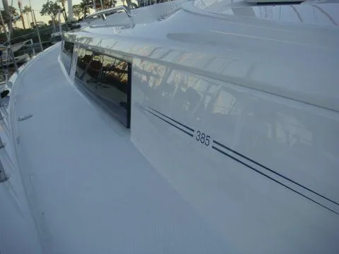 Bonejour Yacht Photos Pics 2012 Hanse 385 yacht, sleek white exterior with reflective windows.