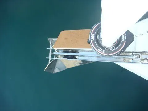 Bonejour Yacht Photos Pics Hanse 385 sailboat anchor and bow detail, 2012 model, on calm water.