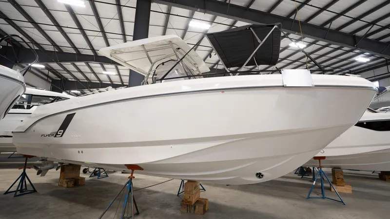  Yacht Photos Pics 2025 Beneteau Flyer 9 SPACEdeck boat in indoor storage facility.