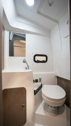  Yacht Photos Pics 2025 Beneteau Flyer 9 SPACEdeck bathroom interior with modern fixtures and compact design.